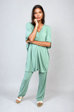 Load image into Gallery viewer, ikrush-tiana-twist-front-plunge-neckline-top-and-trouser-co-ord-set-1712173174-DSC4152_48aada25-b777-488e-ab71-d9ed46ff7327.png